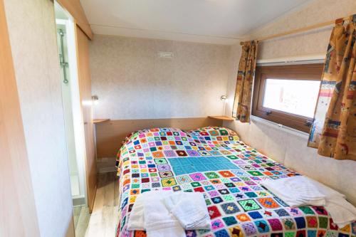 agrivillage_2_casina_primula_letto_matrimoniale