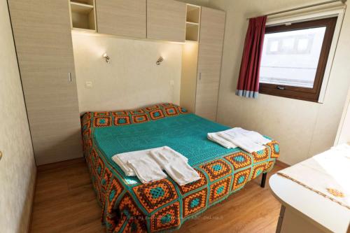 agrivillage_4_casina_della_ginestra_letto_matrimoniale
