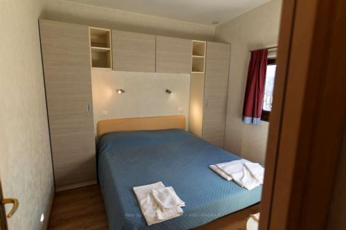 agrivillage_casina_della_rosa_letto_matrimoniale