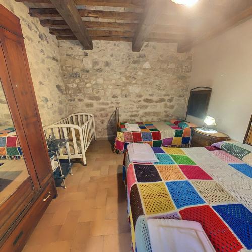 alloggio_dei_buoi_camera_letto_quadrupla_con_lettino